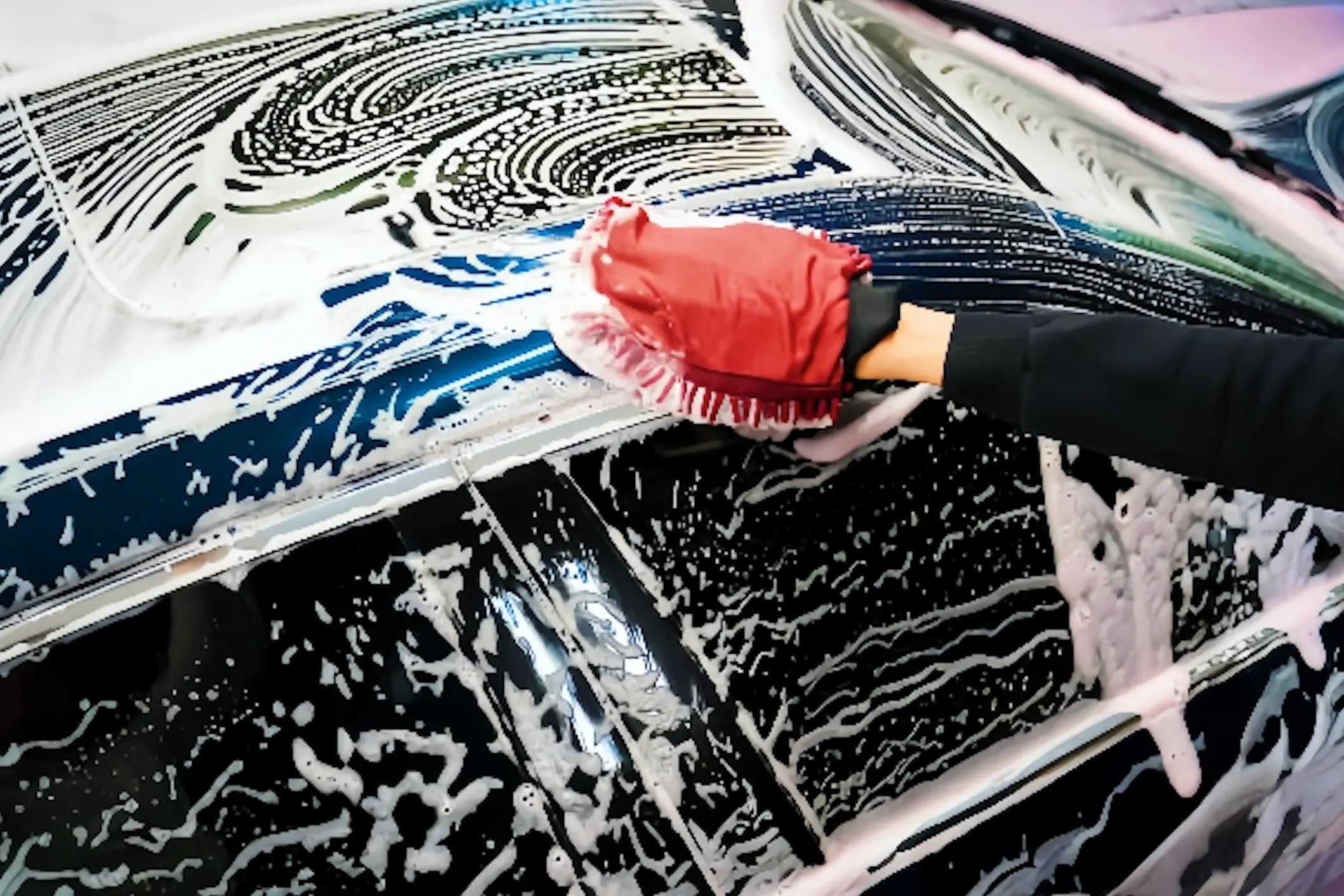 Exterior detailing service showing car wash and tire shine